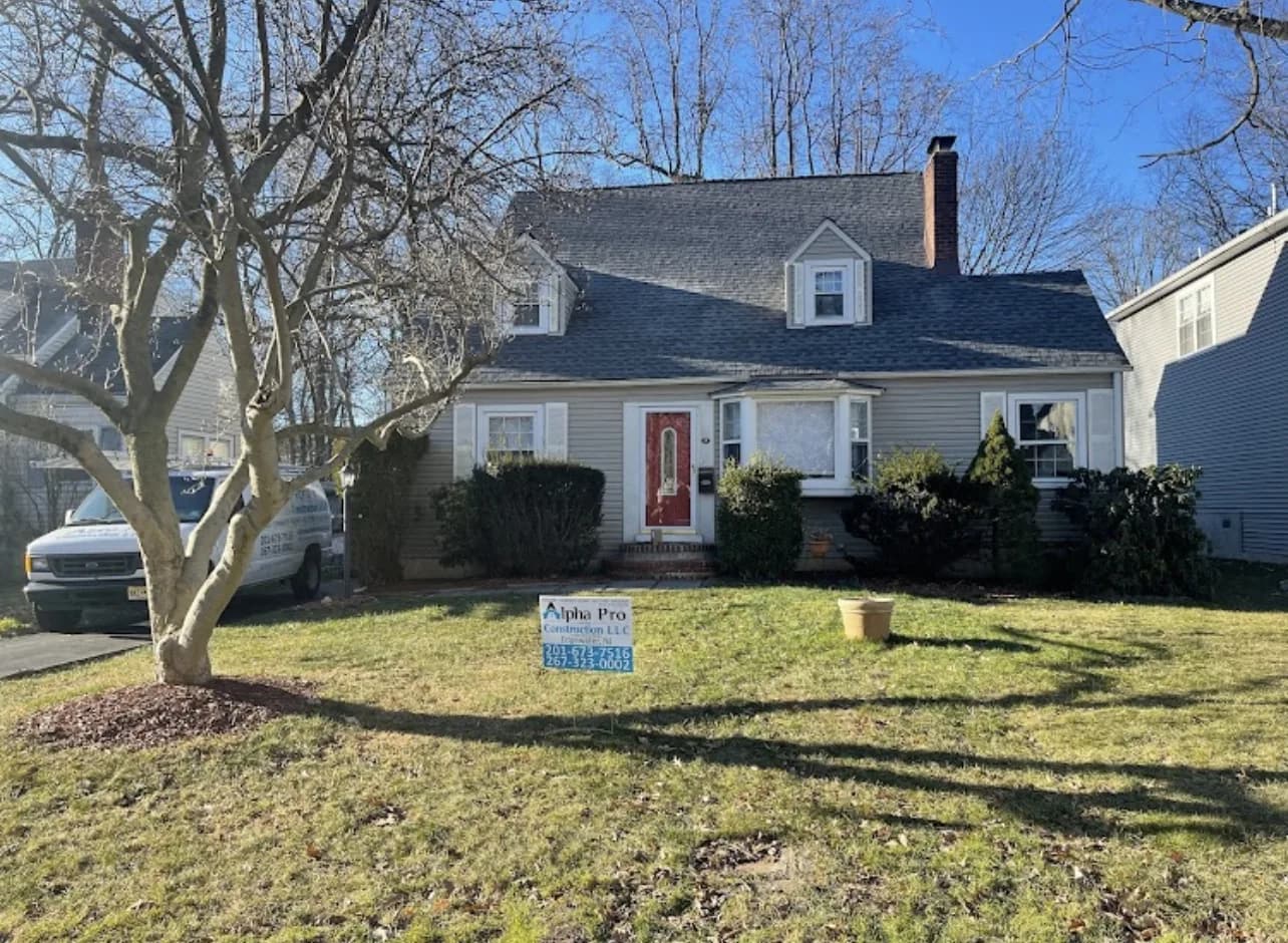 Completed roof on a classic New Jersey colonial-style home, the architectural style most often paired with slate roofing