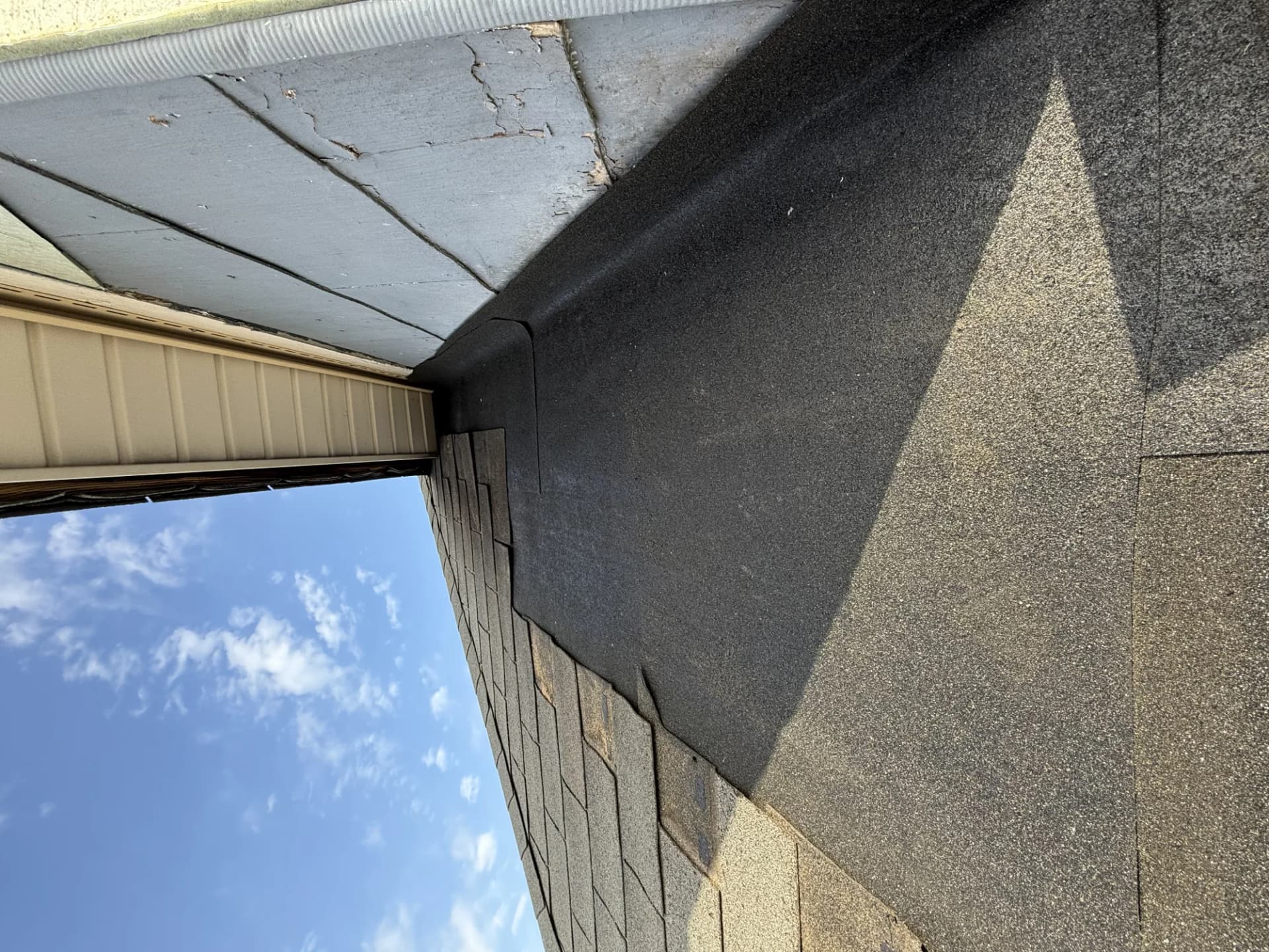 Eave flashing and self-adhering underlayment installation on a New Jersey roof to prevent ice dam water infiltration